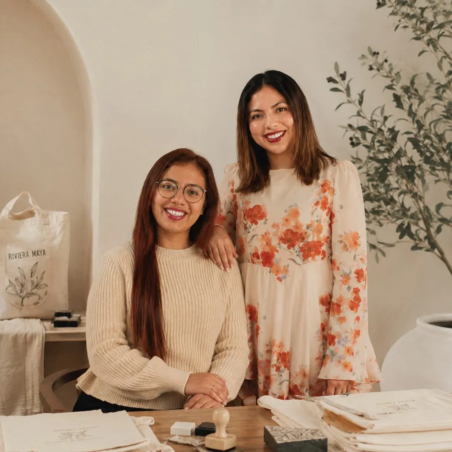 The two sisters who run Riviera Made, at the work table in the studio in Puerto Morelos
